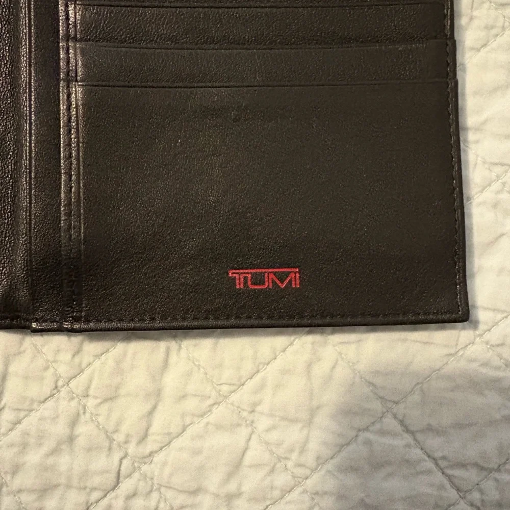 Tumi travel wallet passport card organizer.